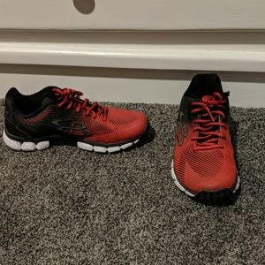 Red and black sports workout shoes